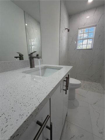 721 Ivan AVE S, Lehigh Acres, FL 33973