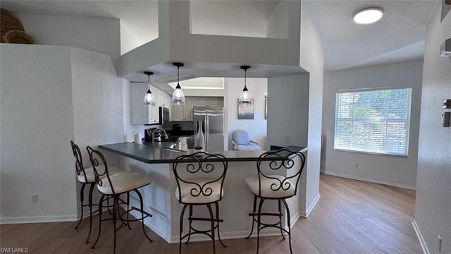 6812 Satinleaf RD S 202, Naples, FL 34109