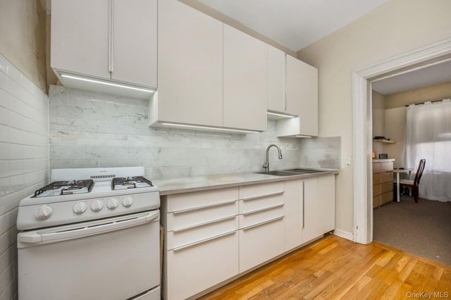 75-30 67th Drive, Middle Village, NY 11379