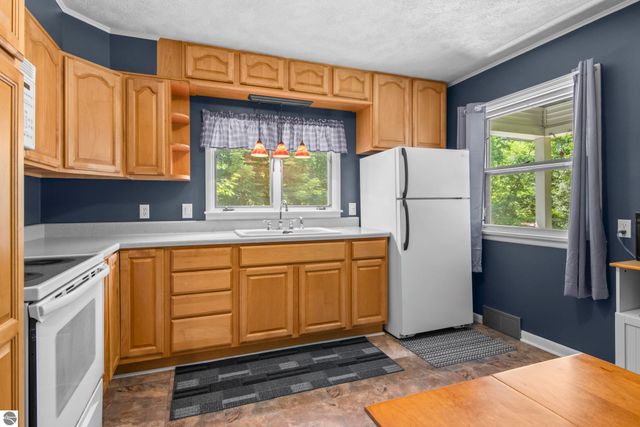 7023 Meadow Brooke Lane, Kewadin, MI 49648