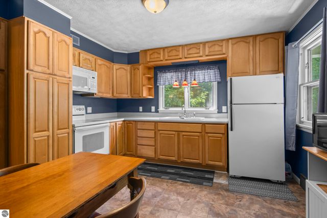 7023 Meadow Brooke Lane, Kewadin, MI 49648