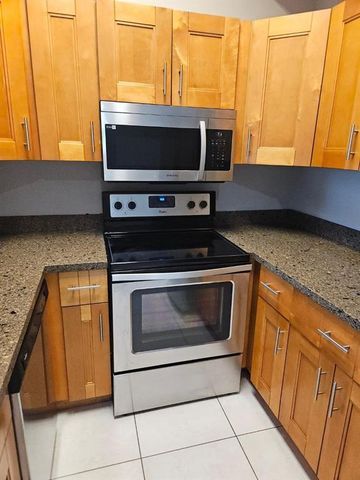 741 LYONS Road 17203, Coconut Creek, FL 33063