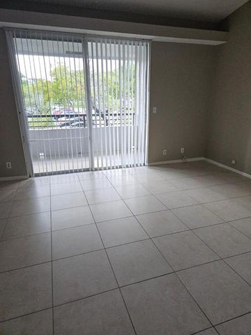 741 LYONS Road 17203, Coconut Creek, FL 33063