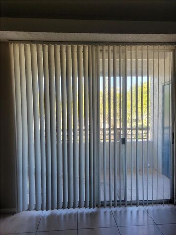 741 LYONS Road 17203, Coconut Creek, FL 33063