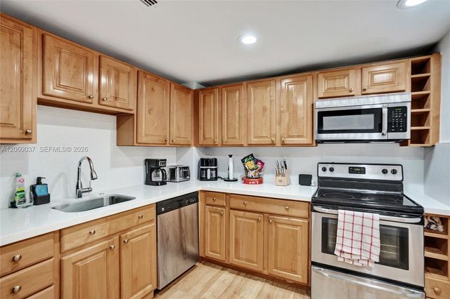 401 Golden Isles Drive 302, Hallandale Beach, FL 33009