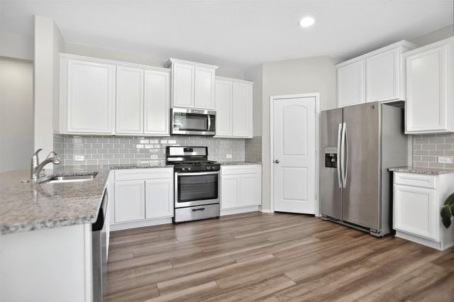 9205 Inland Leather Lane, Conroe, TX 77385