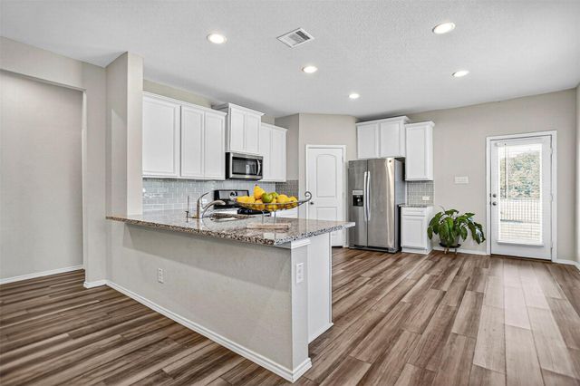 9205 Inland Leather Lane, Conroe, TX 77385