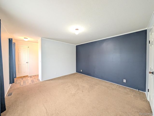 11045 Woodland Ridge Court, Green Oak Township, MI 48178