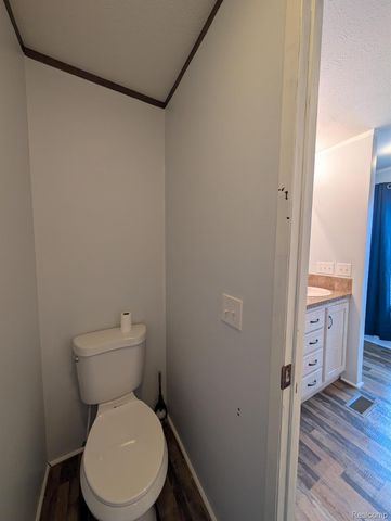 11045 Woodland Ridge Court, Green Oak Township, MI 48178