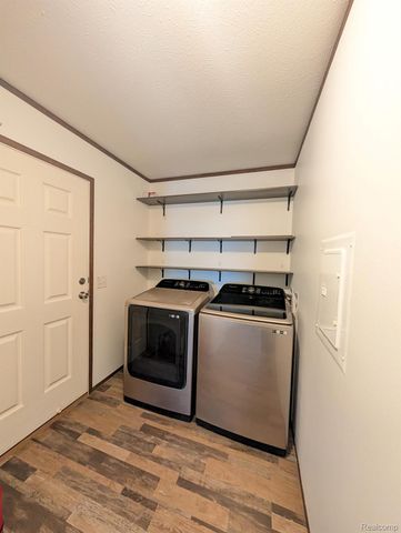 11045 Woodland Ridge Court, Green Oak Township, MI 48178