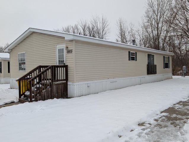 11045 Woodland Ridge Court, Green Oak Township, MI 48178