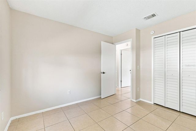 7720 LAKESIDE WOODS DRIVE, Orlando, FL 32810
