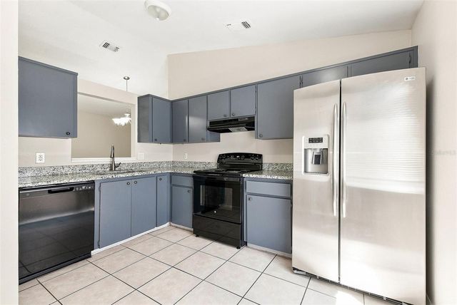 7720 LAKESIDE WOODS DRIVE, Orlando, FL 32810