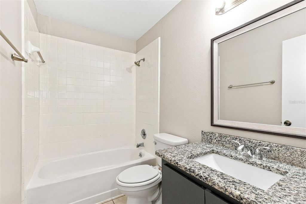 Image 14 of property listing at 7720 LAKESIDE WOODS DRIVE, Orlando, FL 32810