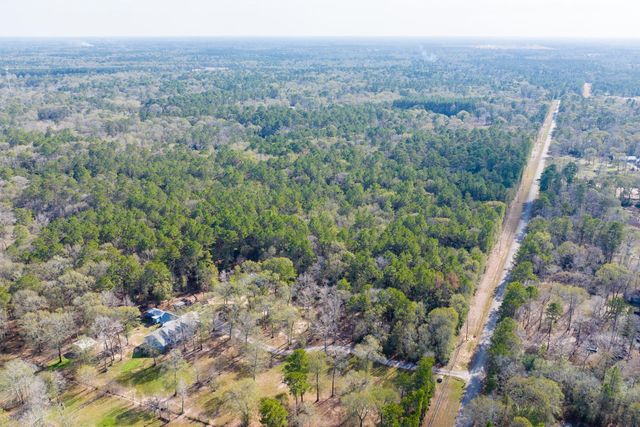 6698 Pine Shadows Road, Cleveland, TX 77328