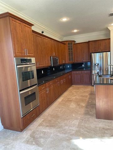 9326 Plantation Estates Dr, Royal Palm Beach, FL 33411