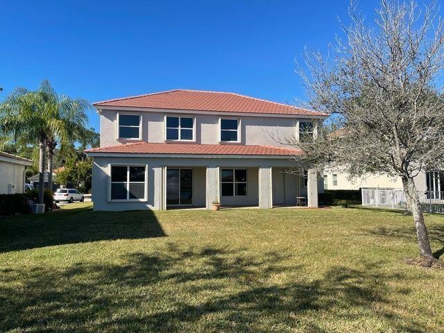 9326 Plantation Estates Dr, Royal Palm Beach, FL 33411