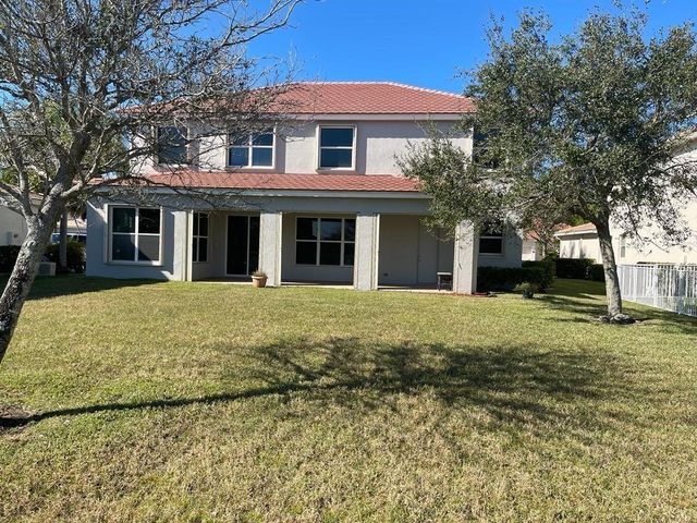 9326 Plantation Estates Dr, Royal Palm Beach, FL 33411