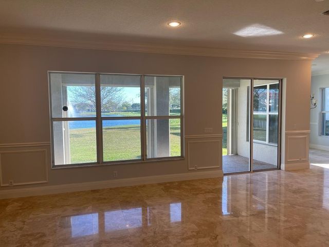 9326 Plantation Estates Dr, Royal Palm Beach, FL 33411