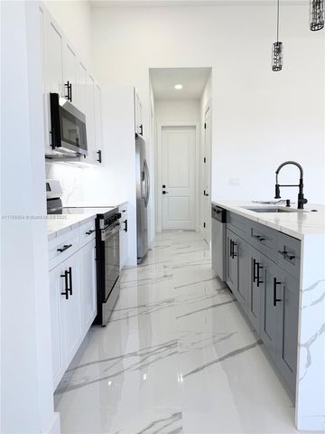 4210 NE 14TH AVENUE, Cape Coral, FL 33909