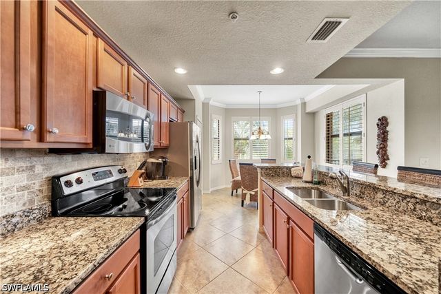 9715 Acqua CT 136, Naples, FL 34113