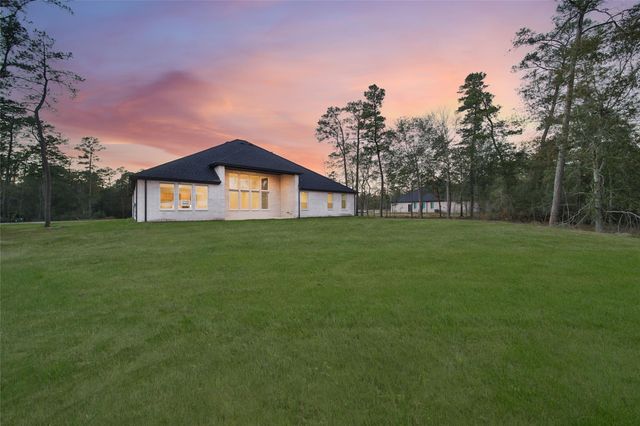 322 Louvenia Court, Pinehurst, TX 77362