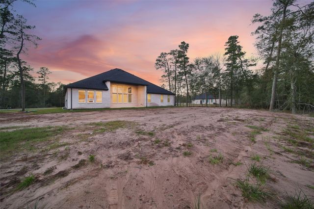 322 Louvenia Court, Pinehurst, TX 77362