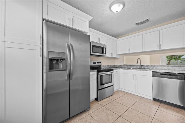 144 Deerfield Court, Jupiter, FL 33458