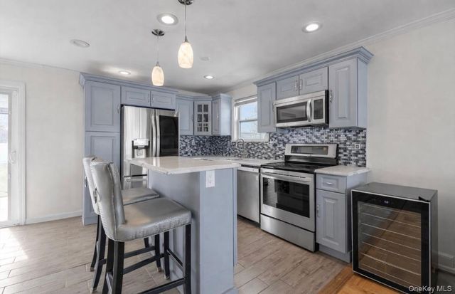 15 Silverpine Drive, Amityville, NY 11701