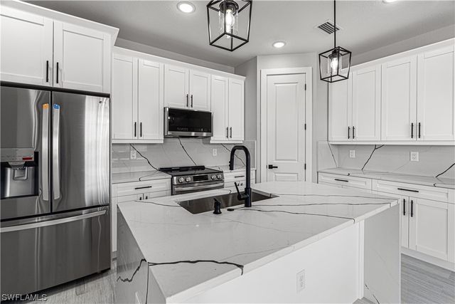 228 NW 22nd CT, Cape Coral, FL 33993