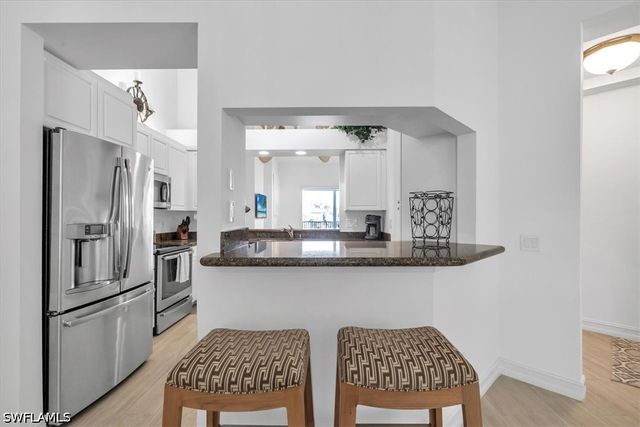 765 Bentwater CIR 203, Naples, FL 34108