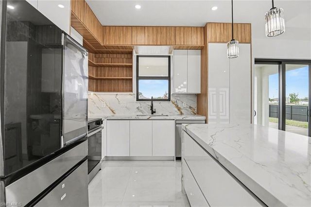 1030 NE Juanita PL, Cape Coral, FL 33909