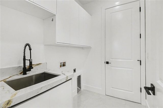 1030 NE Juanita PL, Cape Coral, FL 33909