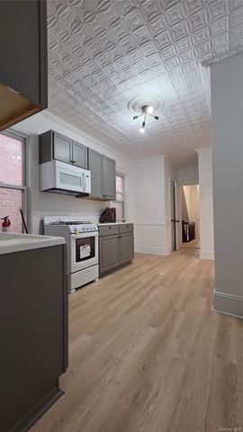 42-21 65th Place, Woodside, NY 11377