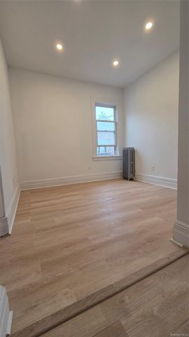 42-21 65th Place, Woodside, NY 11377