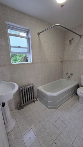 42-21 65th Place, Woodside, NY 11377