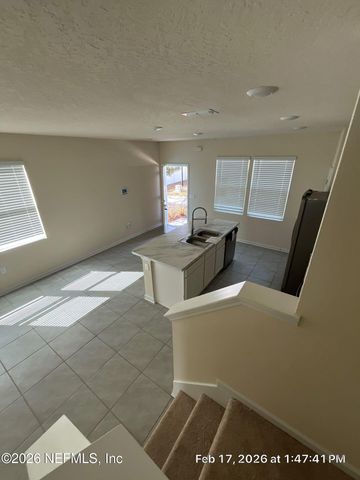 593 RUNNING WOODS Street, Orange Park, FL 32065