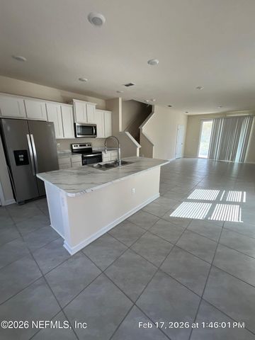 593 RUNNING WOODS Street, Orange Park, FL 32065