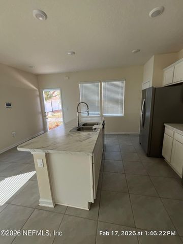 593 RUNNING WOODS Street, Orange Park, FL 32065