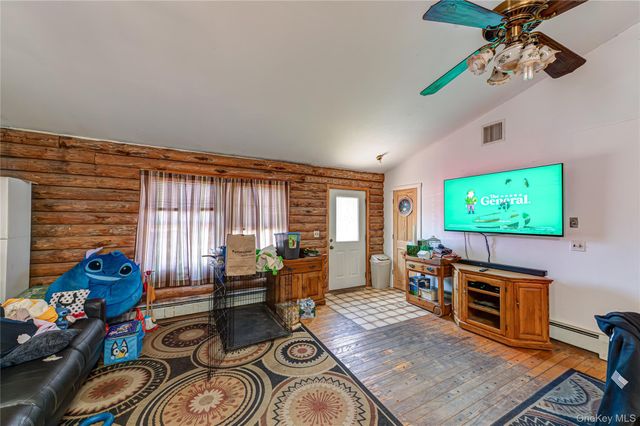 97 Woodlot Road, Ridge, NY 11961