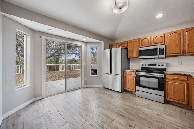 10047 LANDPORT WAY, Land O Lakes, FL 34638