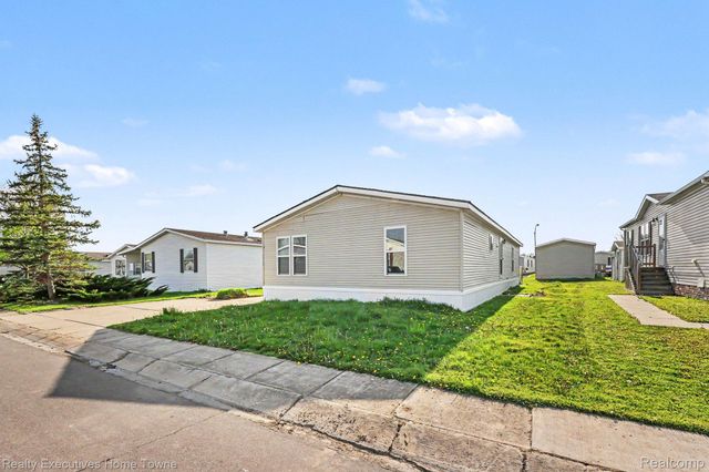 59587 Susan Ln N., New Haven Village, MI 48048