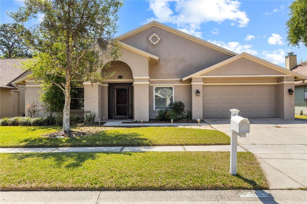 Image 2 of property listing at 9503 PEBBLE GLEN AVENUE, Tampa, FL 33647