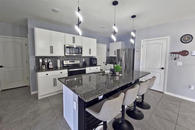 1292 CASCADES AVENUE, Davenport, FL 33837