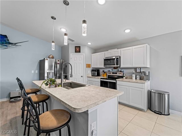 917 NW 13th AVE, Cape Coral, FL 33993