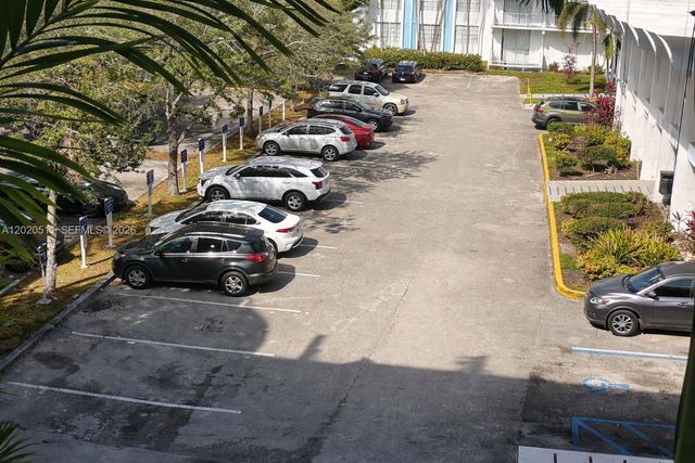 496 NW 165th D-412, Miami, FL 33169