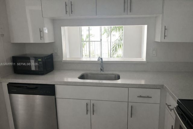 496 NW 165th D-412, Miami, FL 33169
