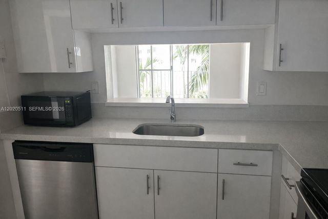 496 NW 165th D-412, Miami, FL 33169