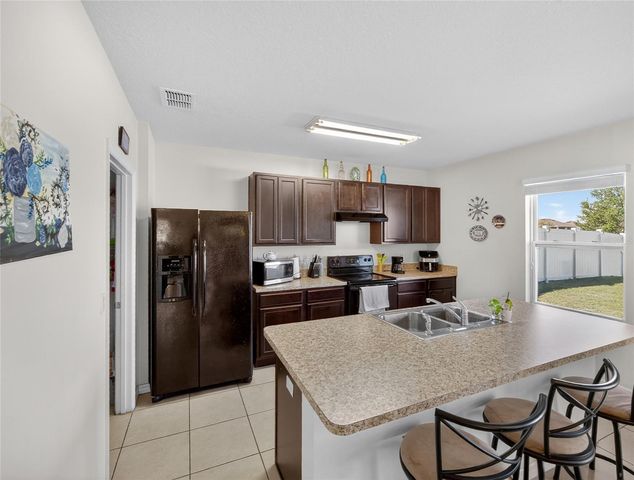 885 FREEDOM BOULEVARD, Davenport, FL 33837