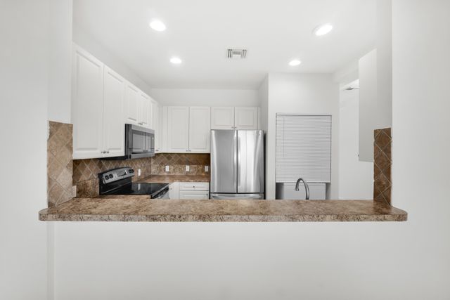 2581 Riverside Drive, Coral Springs, FL 33065